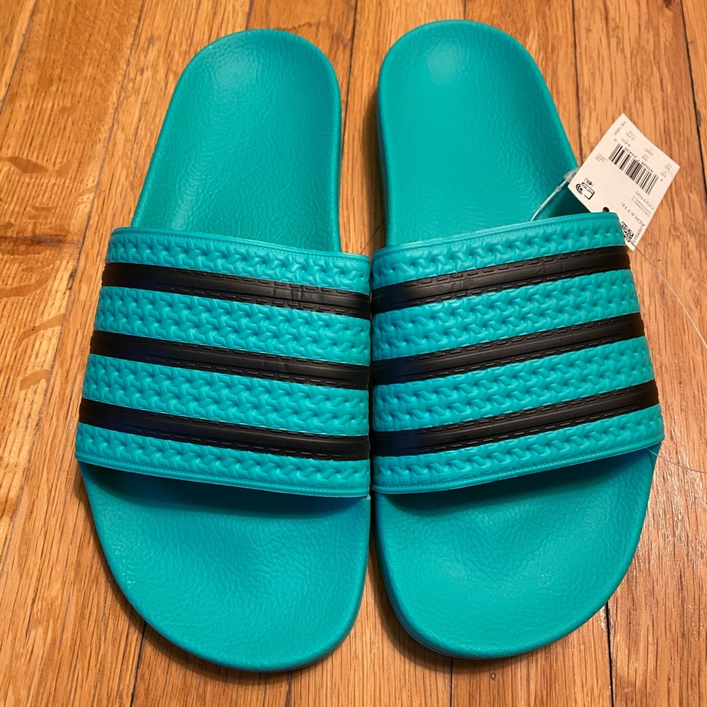 Adidas Men’s Adilette slides in turquoise
